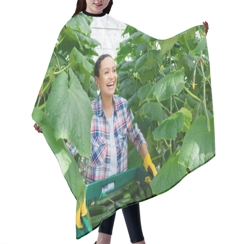 Personality  Cheerful African American Farmer Laughing While Holding Box With Fresh Cucumbers Hair Cutting Cape