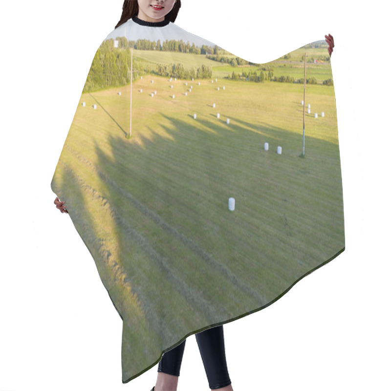 Personality  Aerial View Of A Rural Field With Hay Bales Scattered Across The Landscape, Surrounded By Trees And Power Lines Casting Long Shadows. Hair Cutting Cape