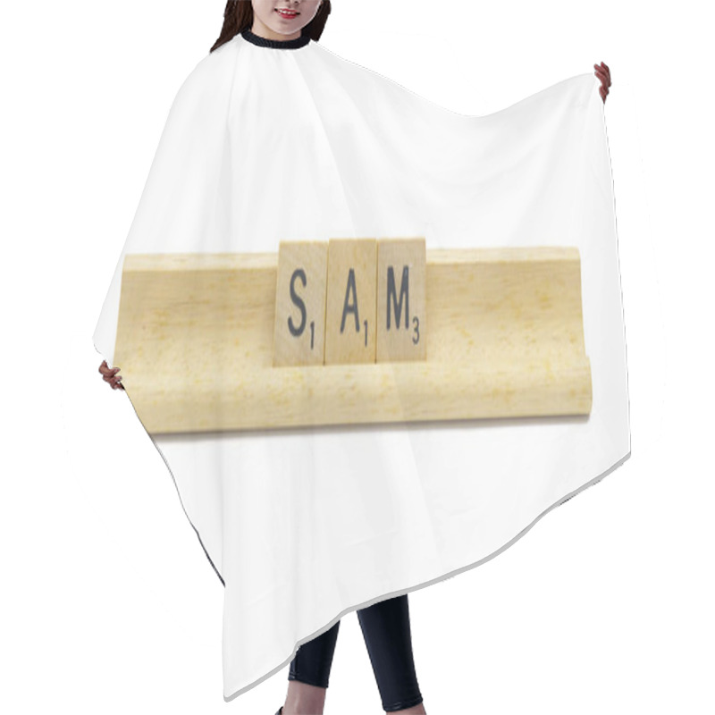 Personality  Miami, FL 4-18-24 Popular Baby Boy First Name Of SAM Made With Square Wooden Tile English Alphabet Letters With Natural Color And Grain On A Wood Rack Holder Isolated On White Background Hair Cutting Cape