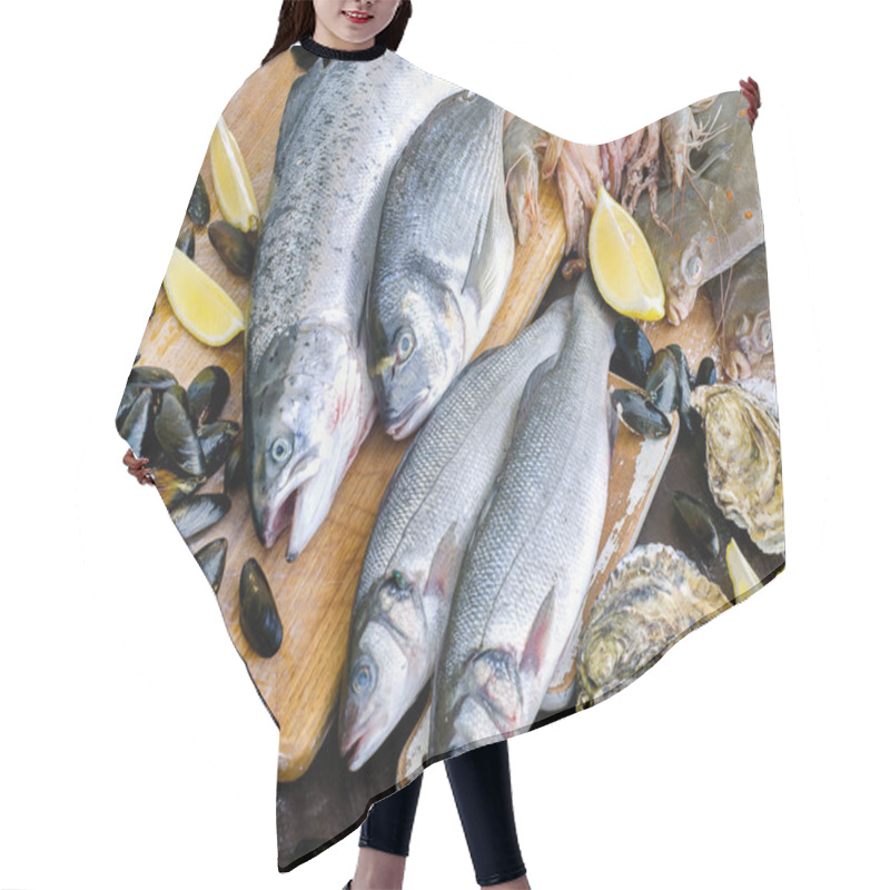 Personality  Raw Seafood On Wooden Board. Healthy Diet Eating. Hair Cutting Cape