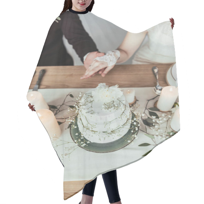 Personality  Partial View Of Newlyweds Holding Hands While Sitting At Served Table With Wedding Cake, Rustic Wedding Concept Hair Cutting Cape