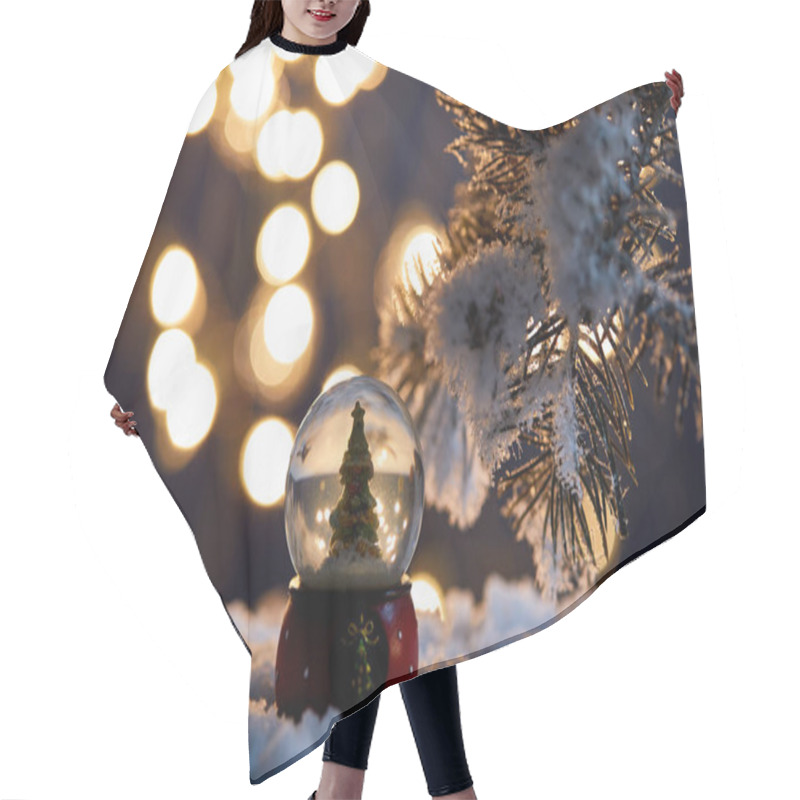 Personality  Little Christmas Tree In Snowball Standing In Snow With Spruce Branches And Blurred Lights At Night  Hair Cutting Cape