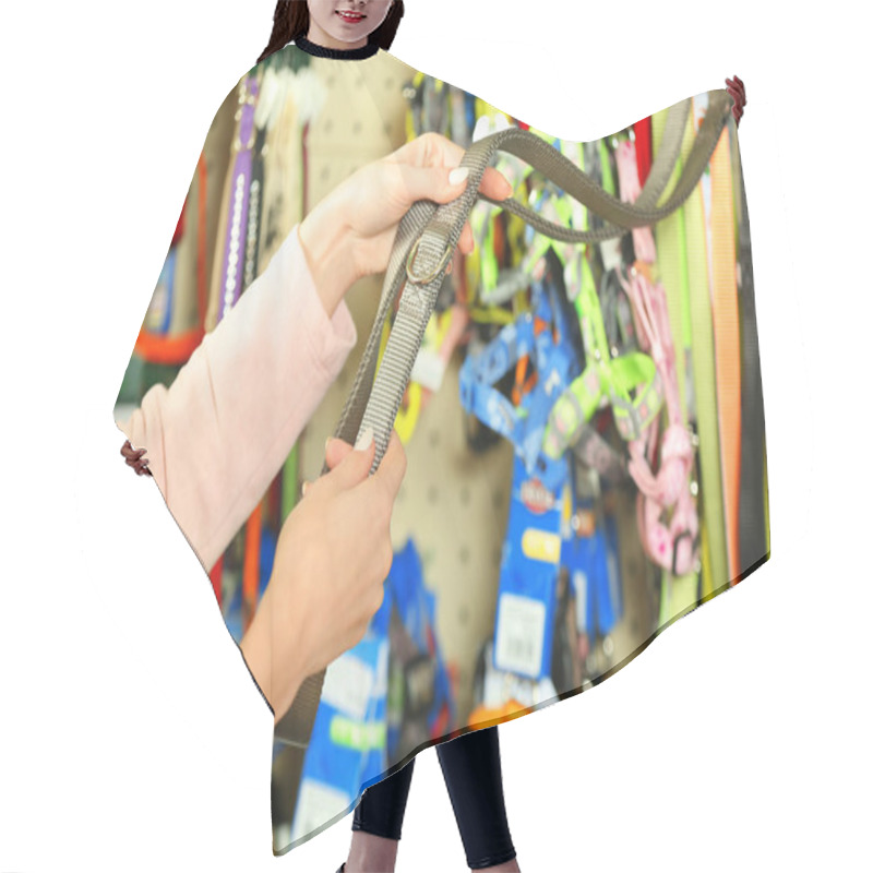 Personality  Hands Of Woman Selecting Lead In Pet Shop, Close Up View Hair Cutting Cape