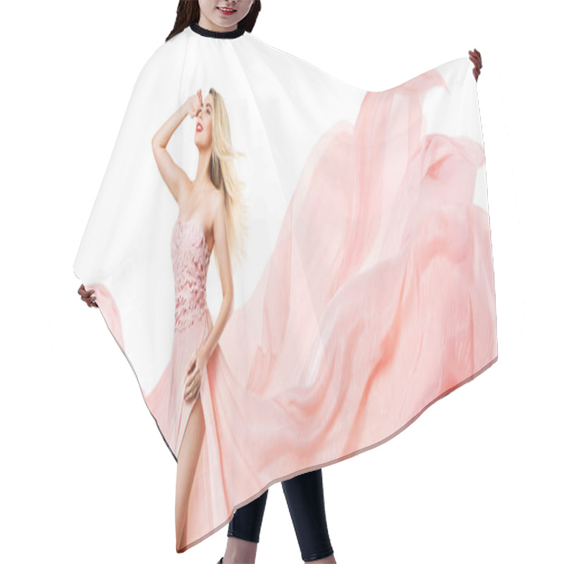 Personality  Fashion Woman In Pink Silk Dress Flying Over White. Happy Blonde Model With Long Wavy Windy Hair Style In Chiffon Gown Over Isolated Studio Background Hair Cutting Cape