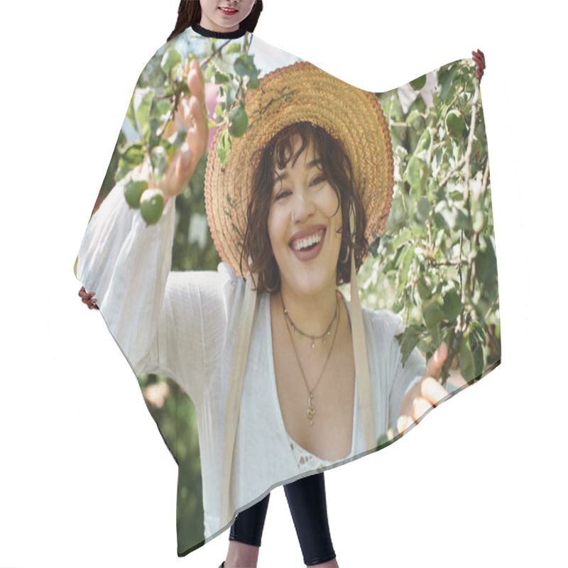 Personality  A Young Woman In A White Blouse And Straw Hat Smiles Brightly As She Enjoys The Beauty Of A Summer Garden. Hair Cutting Cape