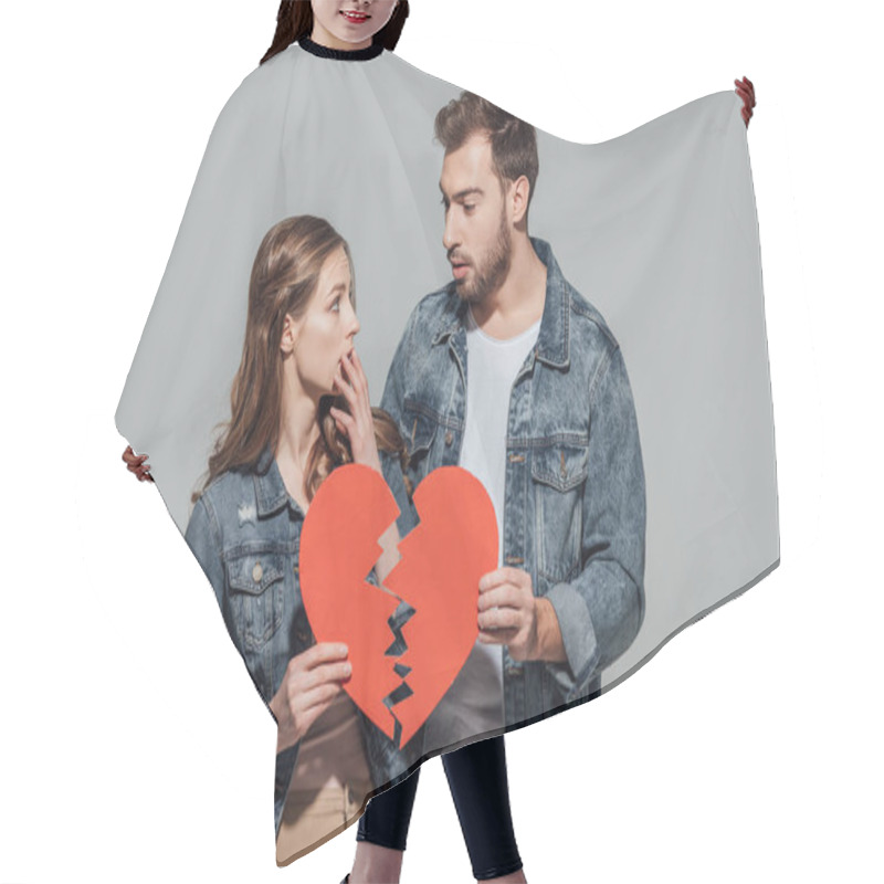 Personality  Upset Young Couple Holding Pieces Of Broken Heart Symbol Isolated On Grey  Hair Cutting Cape