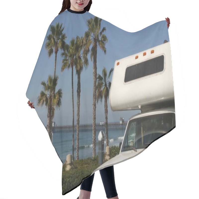 Personality  Motorhome Trailer Or Caravan For Road Trip. Ocean Beach, California USA. Camper Van, RV Motor Home. Hair Cutting Cape