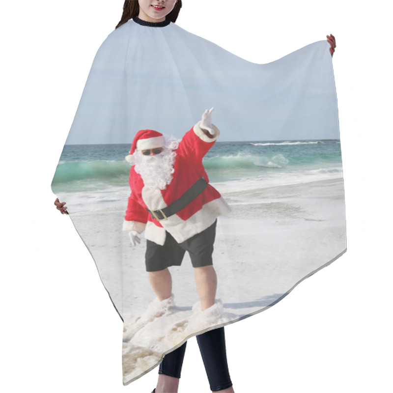 Personality  Surfing Santa. Santa Claus Is Riding A Surf Board. Santa Claus In Sunglasses Surfing In The Ocean. Santa Claus Surfs On His Surf Board While On A Beautiful Beach With A Blue Ocean. Christmas Vacation. Hair Cutting Cape