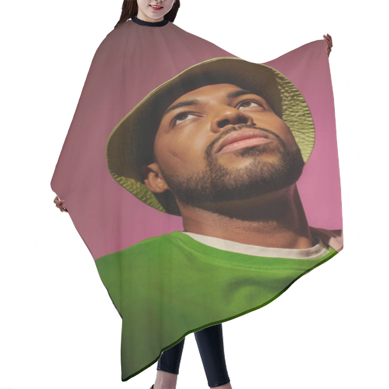 Personality  Good Looking Bearded Man In Green Panama And Sweatshirt Looking Away On Pink Backdrop, Fashion Hair Cutting Cape