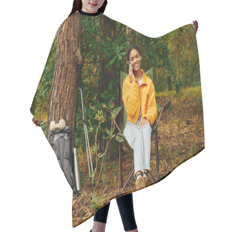 Personality  A Young Woman In An Orange Jacket Is Happily Chatting On Her Phone Amidst Colorful Autumn Trees While Hiking. Hair Cutting Cape