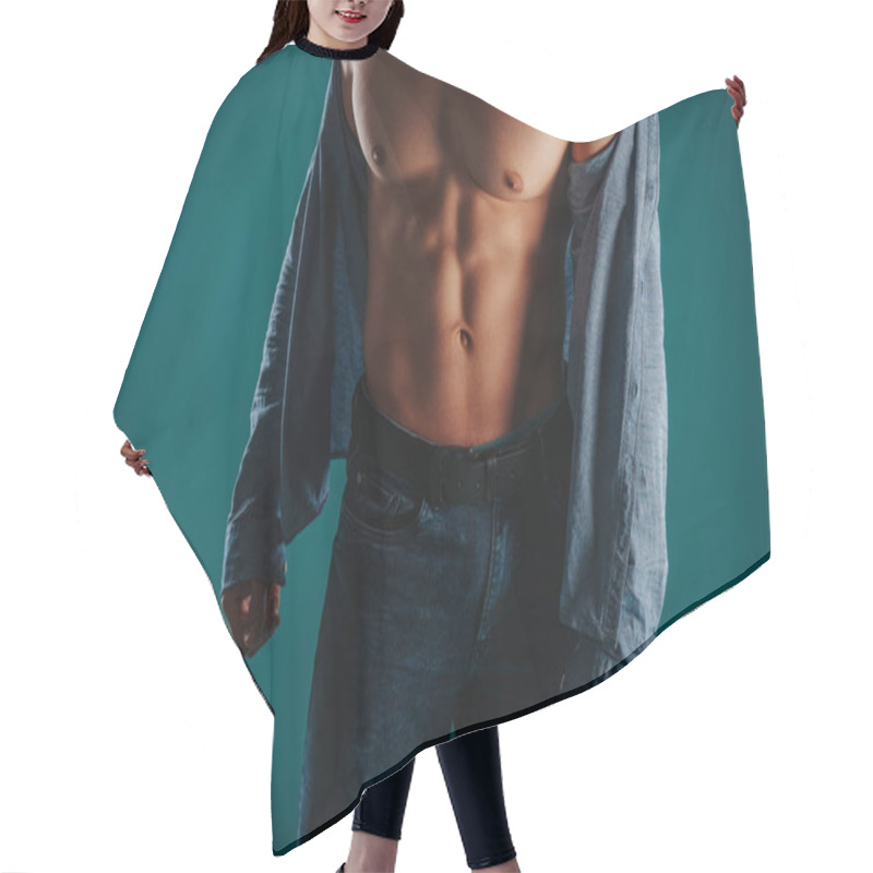 Personality  Well-built And Stunning Man Standing In A Green Room And Posing Hair Cutting Cape