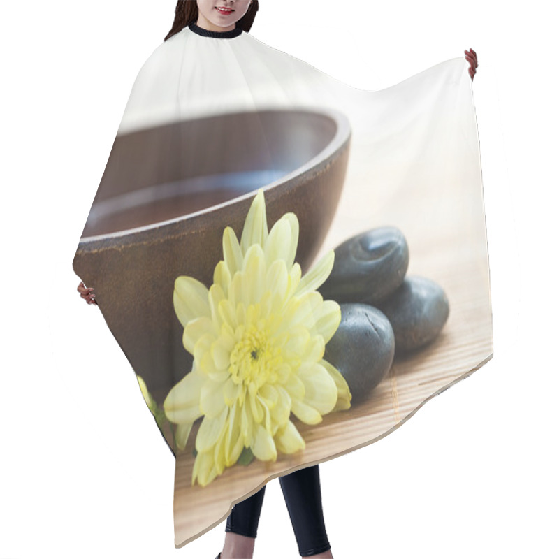 Personality  Spa Setting With Hot Stones With Chrysanthemum And Bowl Of Water. Hair Cutting Cape