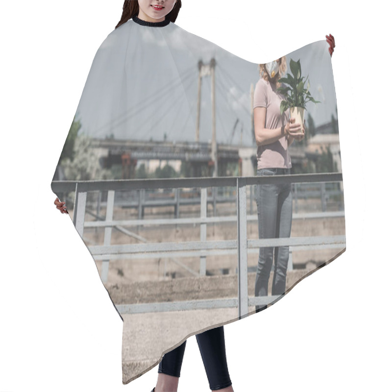 Personality  Woman In Protective Mask Holding Potted Plant On Bridge And Looking Away, Air Pollution Concept Hair Cutting Cape