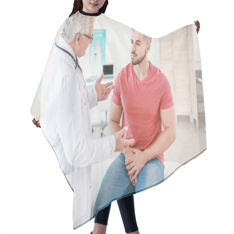 Personality  Young Man Visiting Urologist In Clinic Hair Cutting Cape