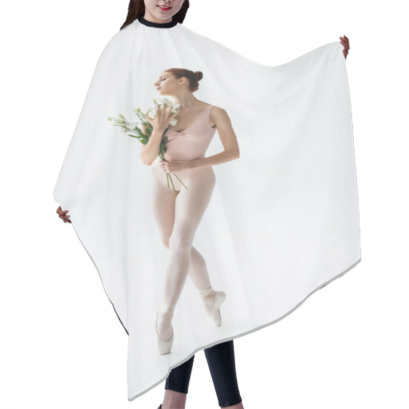 Personality  Full Length Of Ballerina In Bodysuit Holding Flowers Isolated On White  Hair Cutting Cape