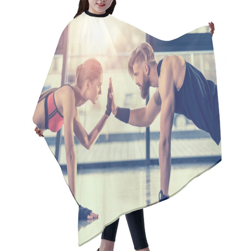 Personality  Side View Of Young Sportsman And Woman Doing Plank Exercise And Giving High Five Hair Cutting Cape