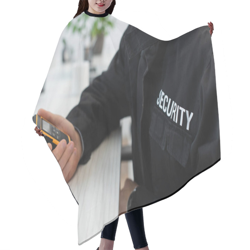 Personality  Cropped View Of Security Man In Black Uniform Holding Walkie-talkie In Office Hair Cutting Cape