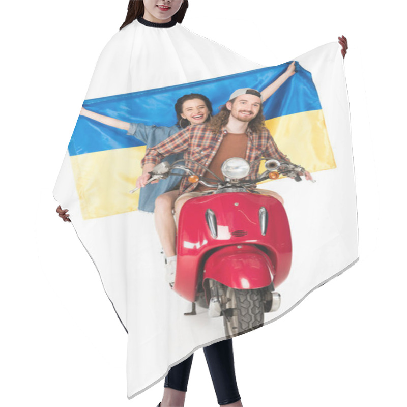 Personality  Full Length View Of Girl Sitting On Red Scooter And Holding Ukranian Flag And Young Man Looking Forward Isolated On White Hair Cutting Cape