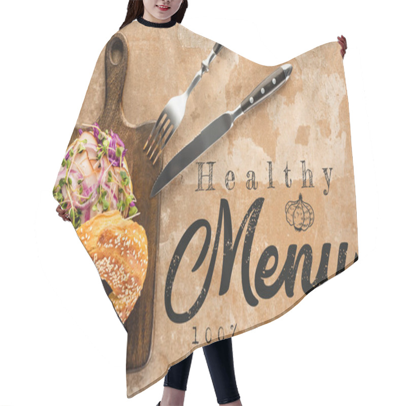 Personality  Top View Of Bagel With Meat On Cutting Board With Cutlery Near The Healthy Menu Lettering On Textured Surface  Hair Cutting Cape