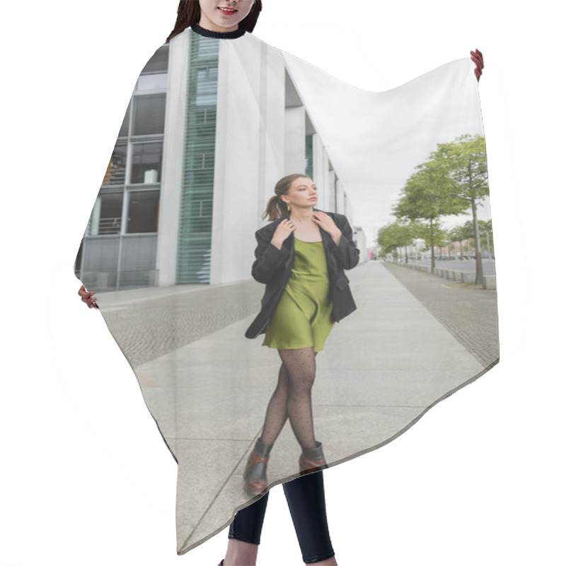 Personality  Full Length Of Stylish Young Woman In Jacket, Boots And Green Silk Dress Standing On Street Hair Cutting Cape