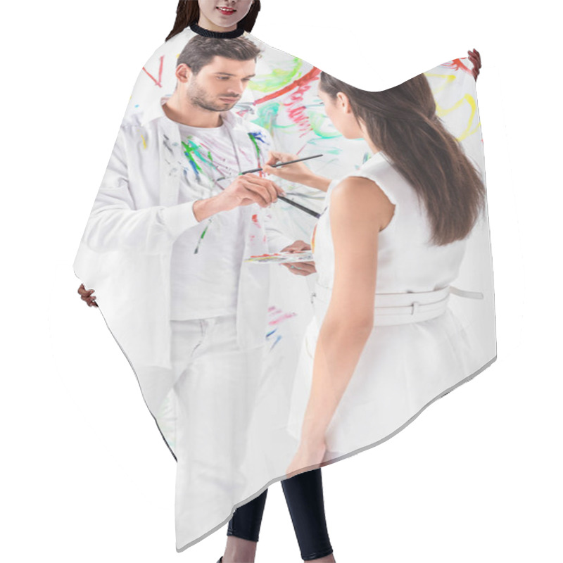 Personality  Close Up Of Adult Couple Drawing On Clothes Against Painted Wall Hair Cutting Cape