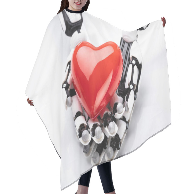 Personality  Elevated View Of Robotic Hand Holding Red Heart Hair Cutting Cape