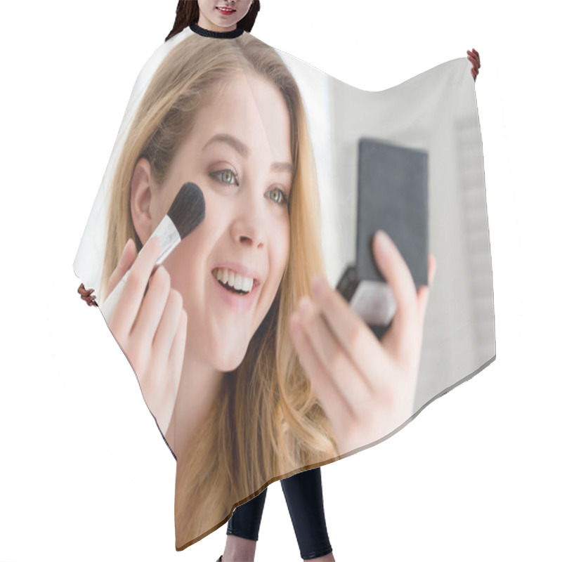 Personality  Attractive Smiling Girl Applying Compact Powder With Brush And Looking At Mirror  Hair Cutting Cape