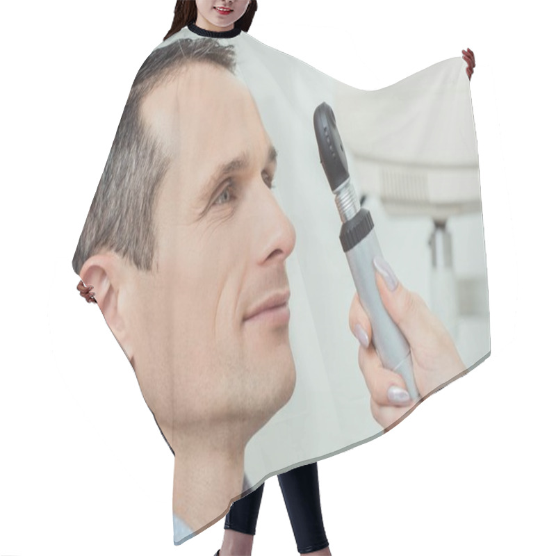 Personality  Side View Of Man Getting Eye Test By Ophthalmologist In Clinic Hair Cutting Cape