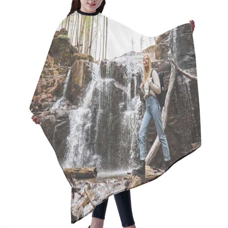 Personality  Young Blonde Female Hiker Crossing The Forest Creek Walking On Rocks Near Waterfall Hair Cutting Cape