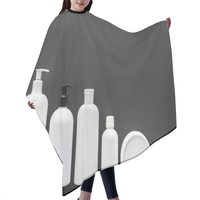 Personality  Top View Of White Plastic Bottles Of Cream Isolated On Black, Beauty Concept Hair Cutting Cape