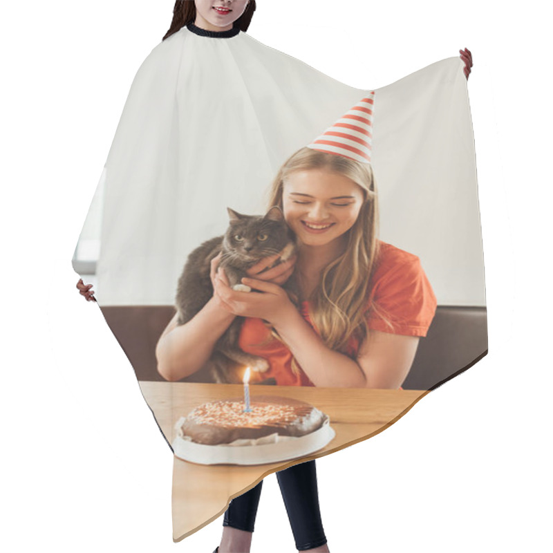 Personality  Happy Girl In Party Cap Looking At Birthday Cake And Holding In Arms Cat  Hair Cutting Cape