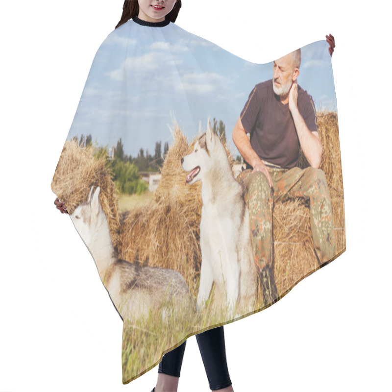 Personality  Old Man With A Beard Sitting On A Haystack With Their Dogs, Enjoying Summer Sunset. Hair Cutting Cape