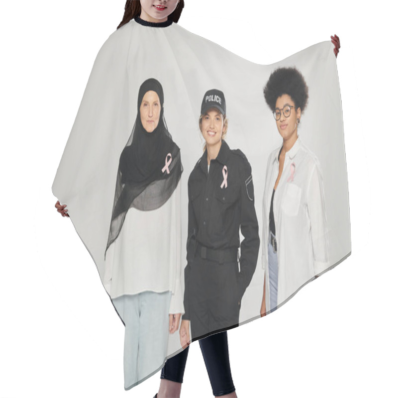 Personality  Smiling Policewoman, Woman In Hijab And African American Woman With Pink Ribbons Isolated On Grey Hair Cutting Cape