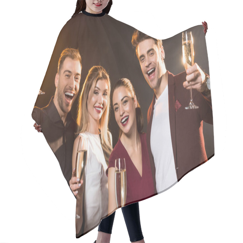 Personality  Group Of Friends Holding Glasses Of Champagne And Looking At Camera During Party On Black Hair Cutting Cape