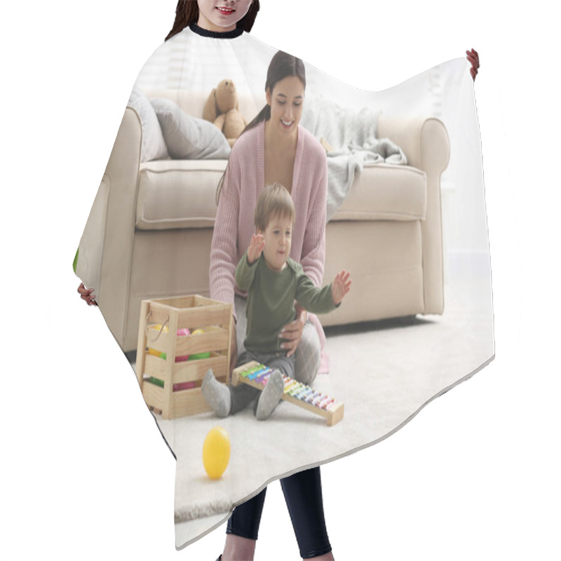 Personality  Young Nanny And Cute Little Baby Playing With Toys At Home Hair Cutting Cape