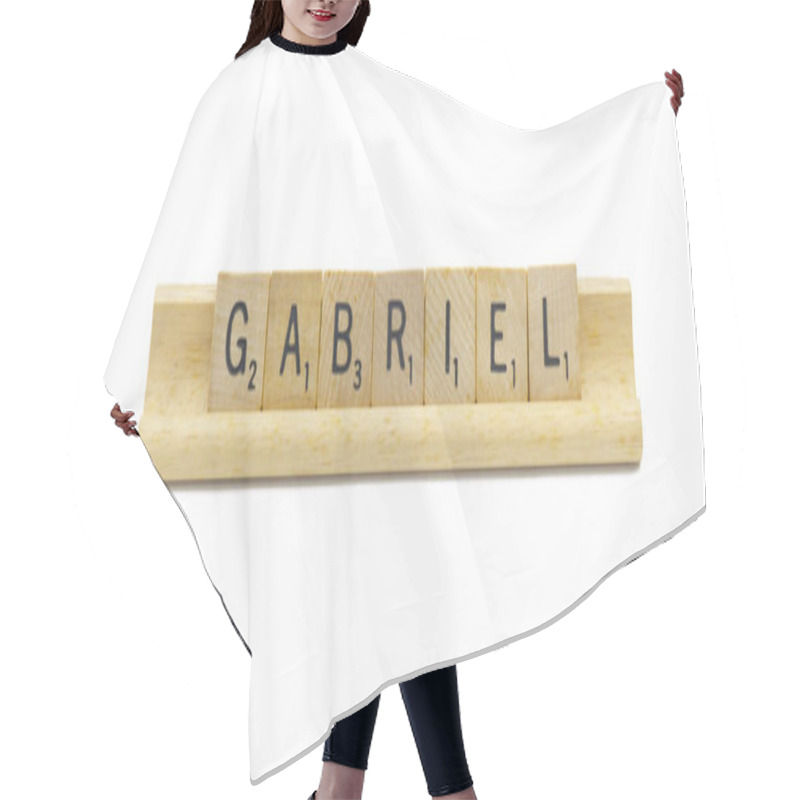 Personality  Miami, FL 4-18-24 Popular Baby Boy First Name Of GABRIEL Made With Square Wooden Tile English Alphabet Letters With Natural Color And Grain On A Wood Rack Holder Isolated On White Background Hair Cutting Cape