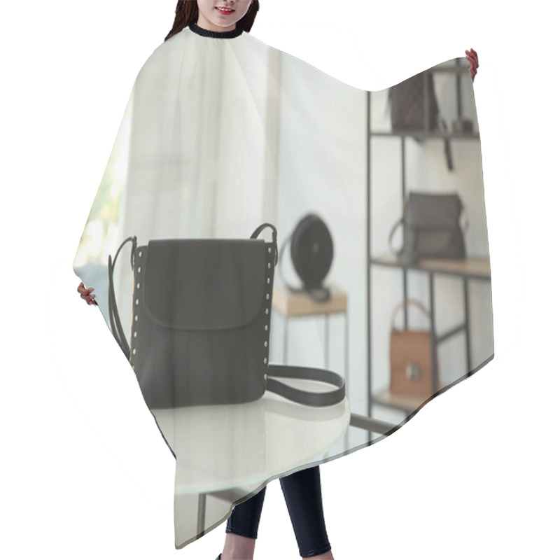 Personality  Stylish Woman's Bag On Stand In Boutique. Space For Text Hair Cutting Cape