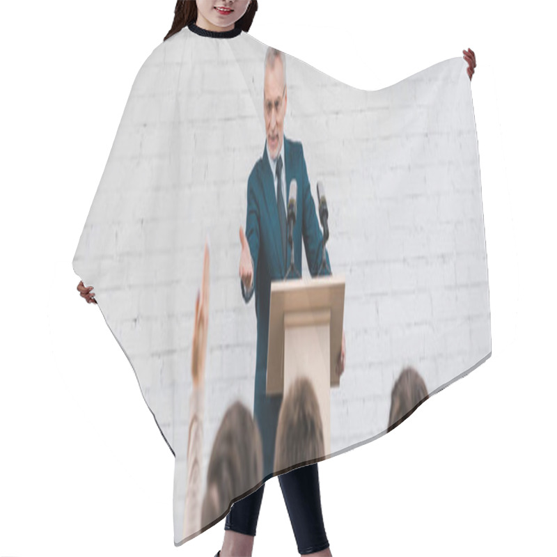 Personality  Panoramic Shot Of Happy Speaker Pointing With Hand At Journalist With Raised Hand  Hair Cutting Cape