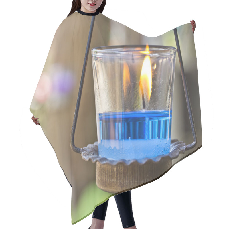 Personality  Calming The Nerves With Blue Aromatic Candle In Spa. Hair Cutting Cape