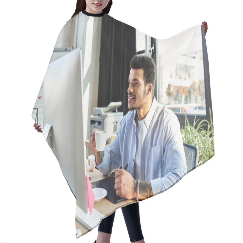 Personality  Smiling Man In A Casual Shirt Sits At A Modern Desk Sipping Coffee And Engaging With His Computer. Hair Cutting Cape