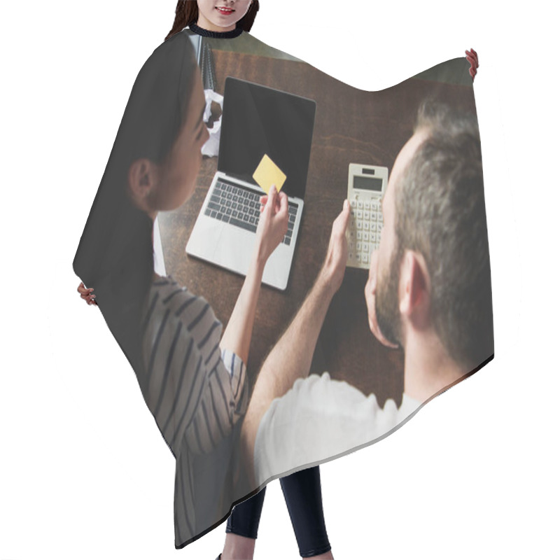 Personality  High Angle View Of Couple Counting Tax And Bills With Laptop And Calculator Hair Cutting Cape