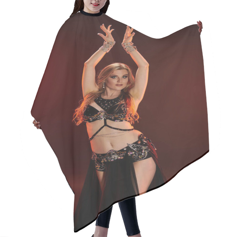 Personality  Woman In Belly Dance Attire Strikes A Captivating Pose. Hair Cutting Cape