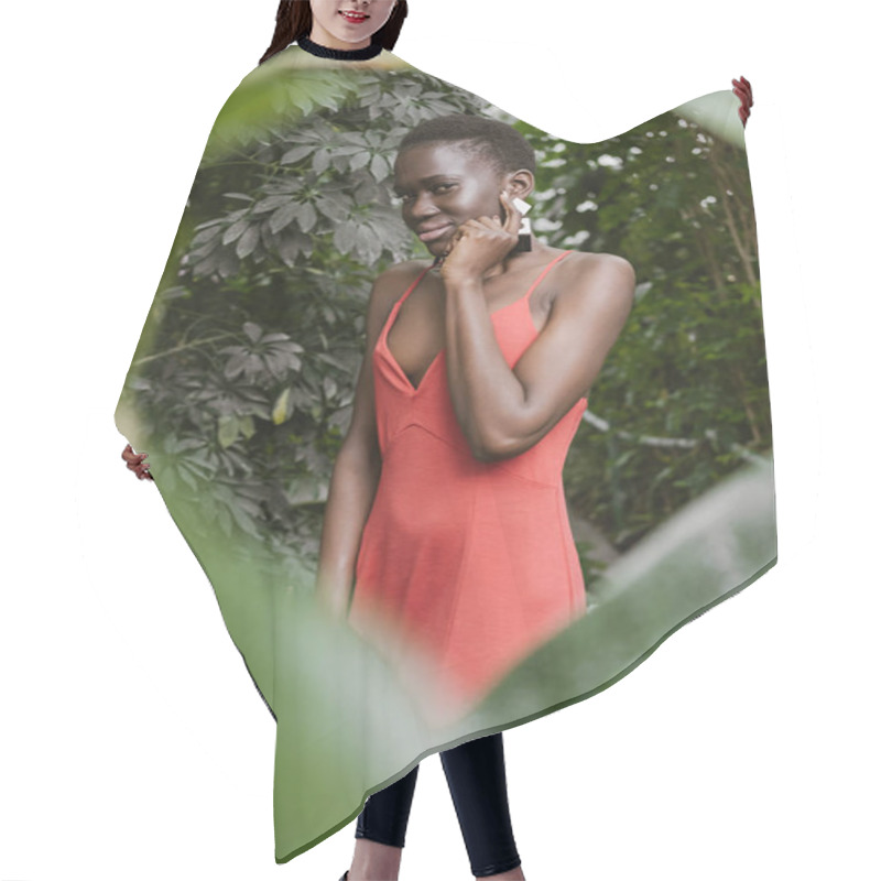 Personality  Selective Focus Of Stylish African American Woman Posing In Red Dress In Garden Hair Cutting Cape