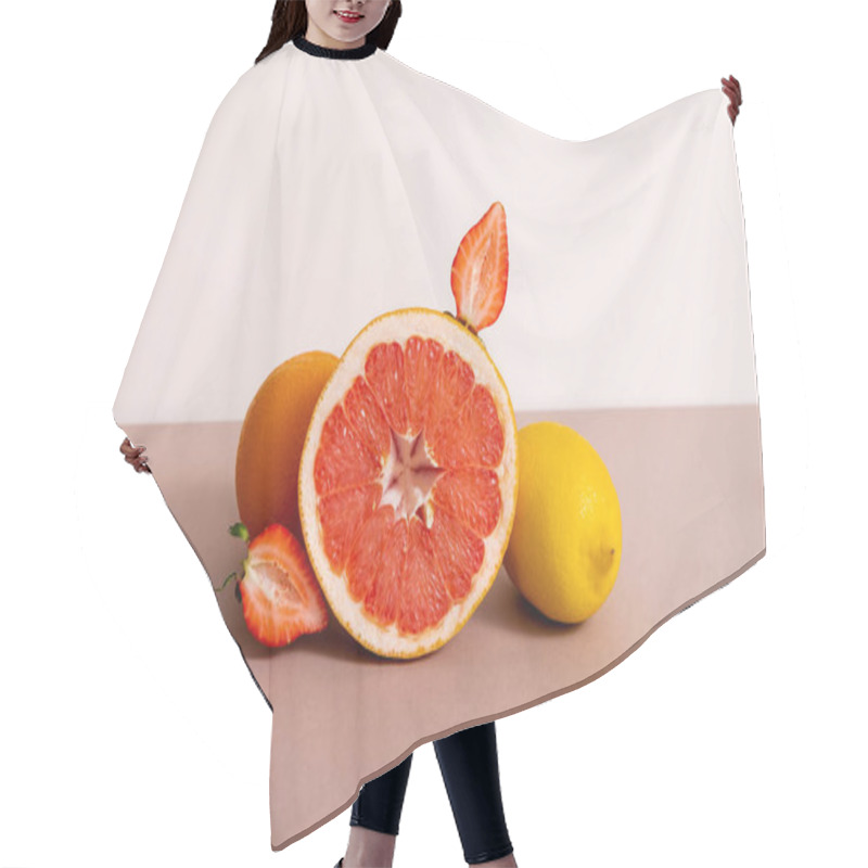 Personality  Fruit Composition With Citrus Fruits And Strawberry Isolated On Beige Hair Cutting Cape