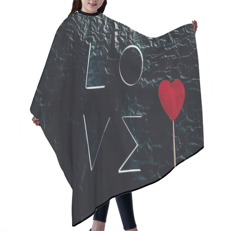 Personality  Word LOVE Made Of Paper Stripes With Heart On Stick On Black Concrete Surface Hair Cutting Cape