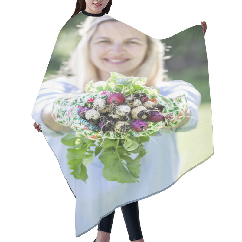 Personality  Blonde Woman Holding Fresh Bio Radishes In Hands While Standing In Vegetable Garden, Gardening Concept  Hair Cutting Cape