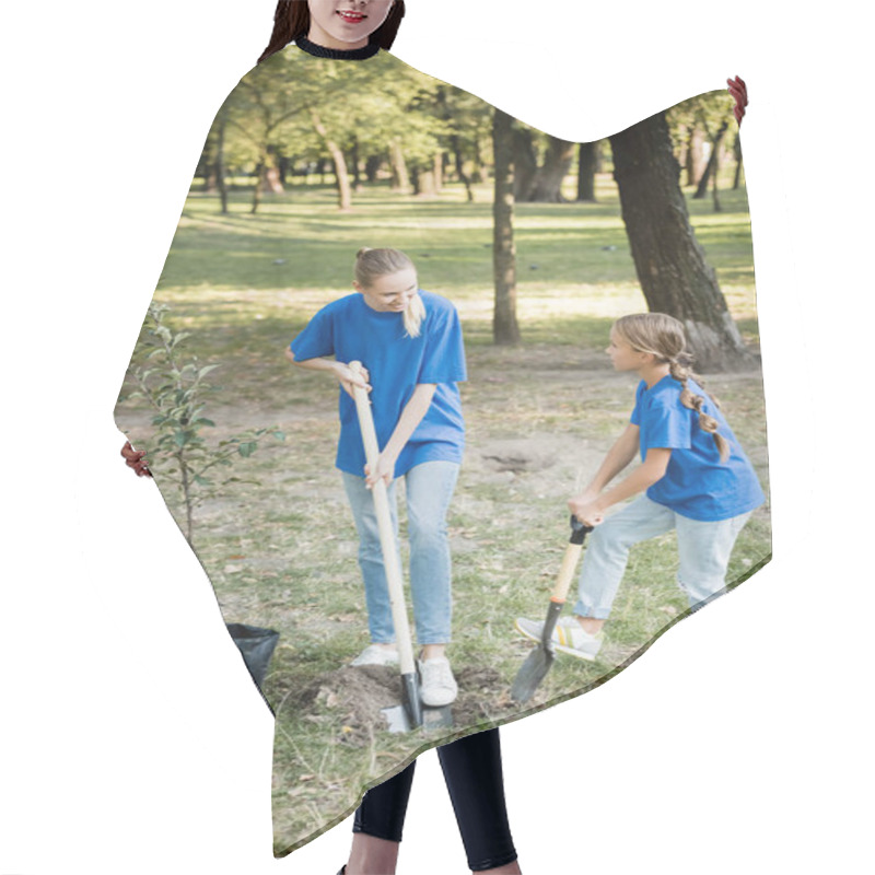 Personality  Daughter And Mother Digging Ground With Shovels Near Watering Can And Young Tree, Ecology Concept Hair Cutting Cape