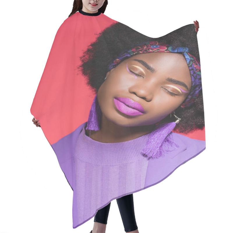 Personality  African American Young Woman With Closed Eyes In Purple Stylish Outfit Isolated On Red Hair Cutting Cape