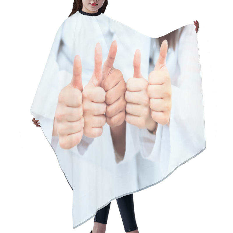 Personality  Portrait Of Confident Doctors Team Showing Thumbs Up While Standing In A Row At Clinic Hair Cutting Cape