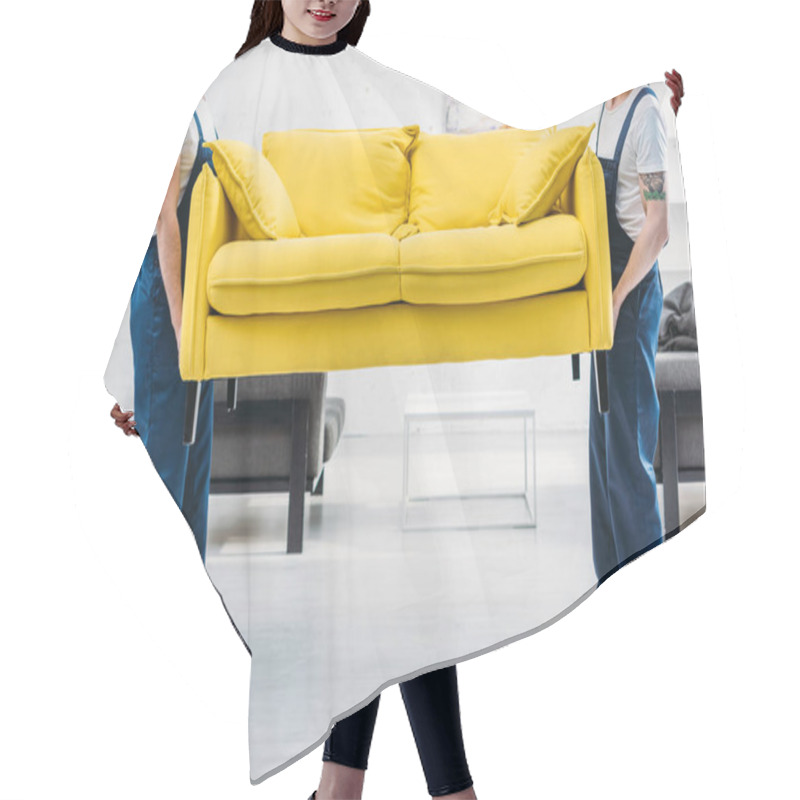 Personality  Cropped View Of Two Movers In Uniform Transporting Couch In Apartment Hair Cutting Cape